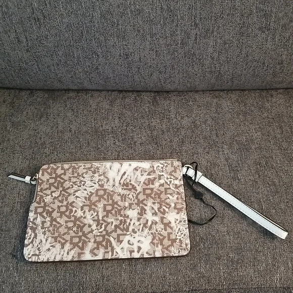 Brand new DKNY medium wristlet. Brown Graffiti pattern. Retails $78 - Picture 4 of 9